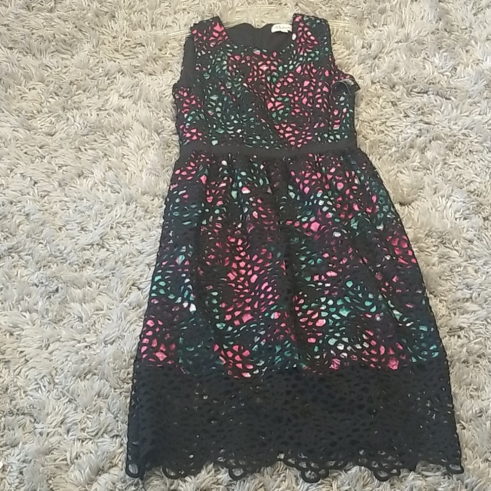 *new with tags*eyelet around the dress*
